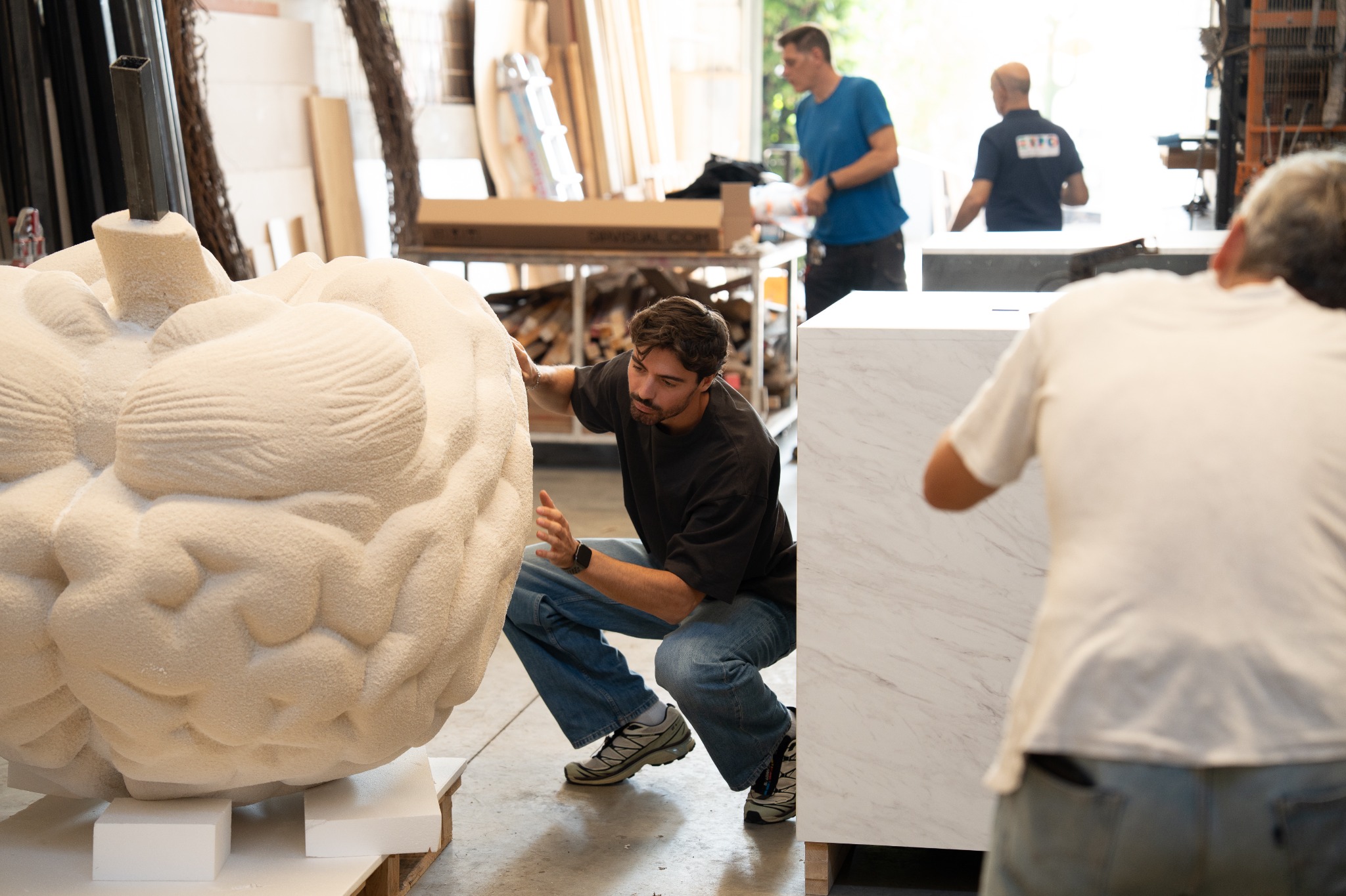 Andrea Olivari working on a brain sculpture in the workshop